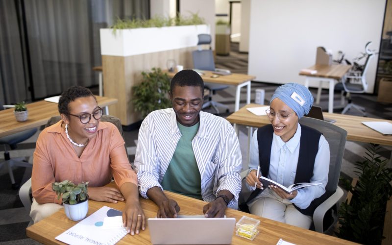 male-employee-getting-used-his-new-office-job-along-with-female-colleagues